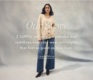  Woman wearing a beige cardigan and blue jeans with text about Z Supply's brand story.